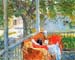 Couch and Veranda at Cos Cob by Hassam