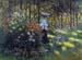 Woman with a parasol in the garden of Argenteuil by Monet