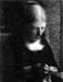 Embroidering (Portrait of the artist's mother) by Seurat