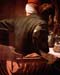 Christ in Emmaus, detail - Disciples of Christ [1] by Caravaggio